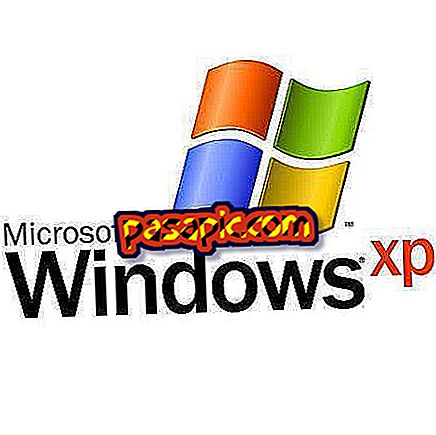 Sådan roterer du skærmen i Windows XP
